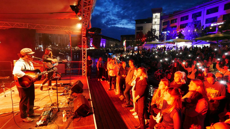  Bühne frei! Bootshafensommer 2026<br><br>Bewerbt euch jetzt und lasst eure Musik Teil des Bootshafensommers werden.