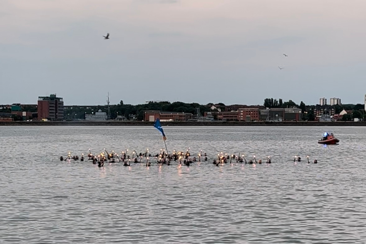 Fackelschwimmer in der Kieler Förde